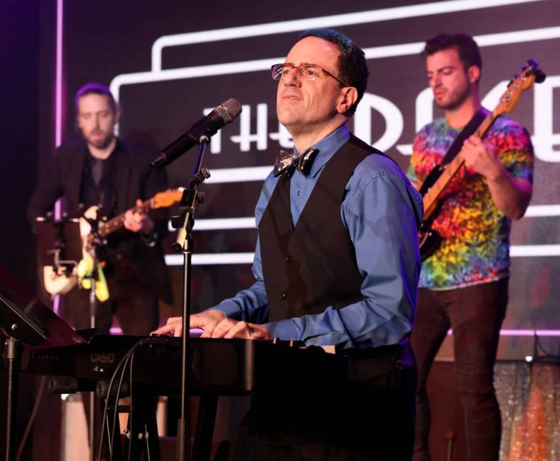 Producer and band leader Kenny Davidsen sings during a birthday party benefit for Las Vegas Rev ...