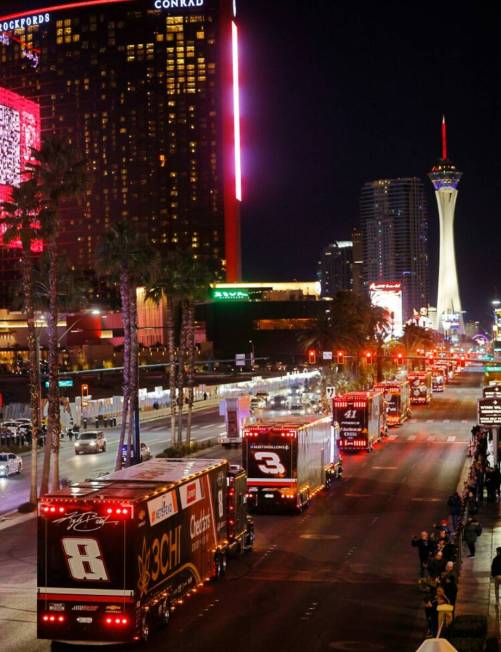 NASCAR Cup Series haulers parade down the Las Vegas Strip, Thursday, March 2, 2023. (Chitose Su ...