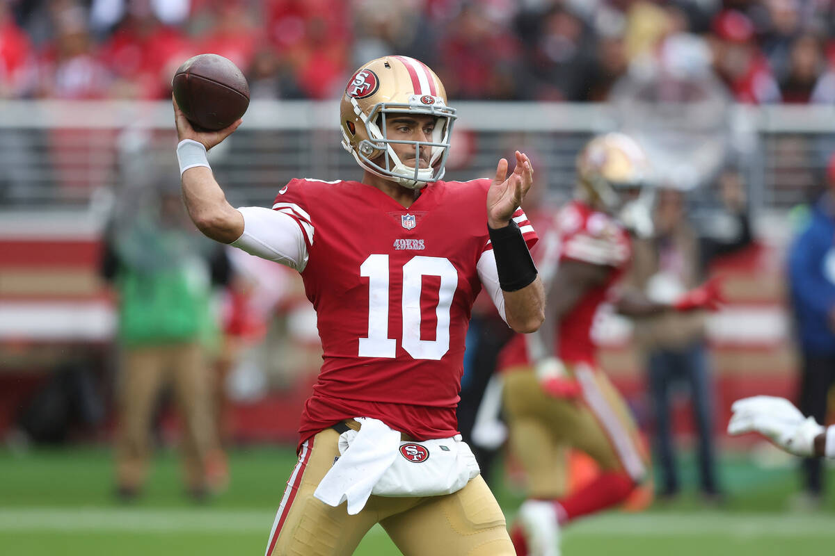 San Francisco 49ers quarterback Jimmy Garoppolo (10) passes the ball against the Seattle Seahaw ...