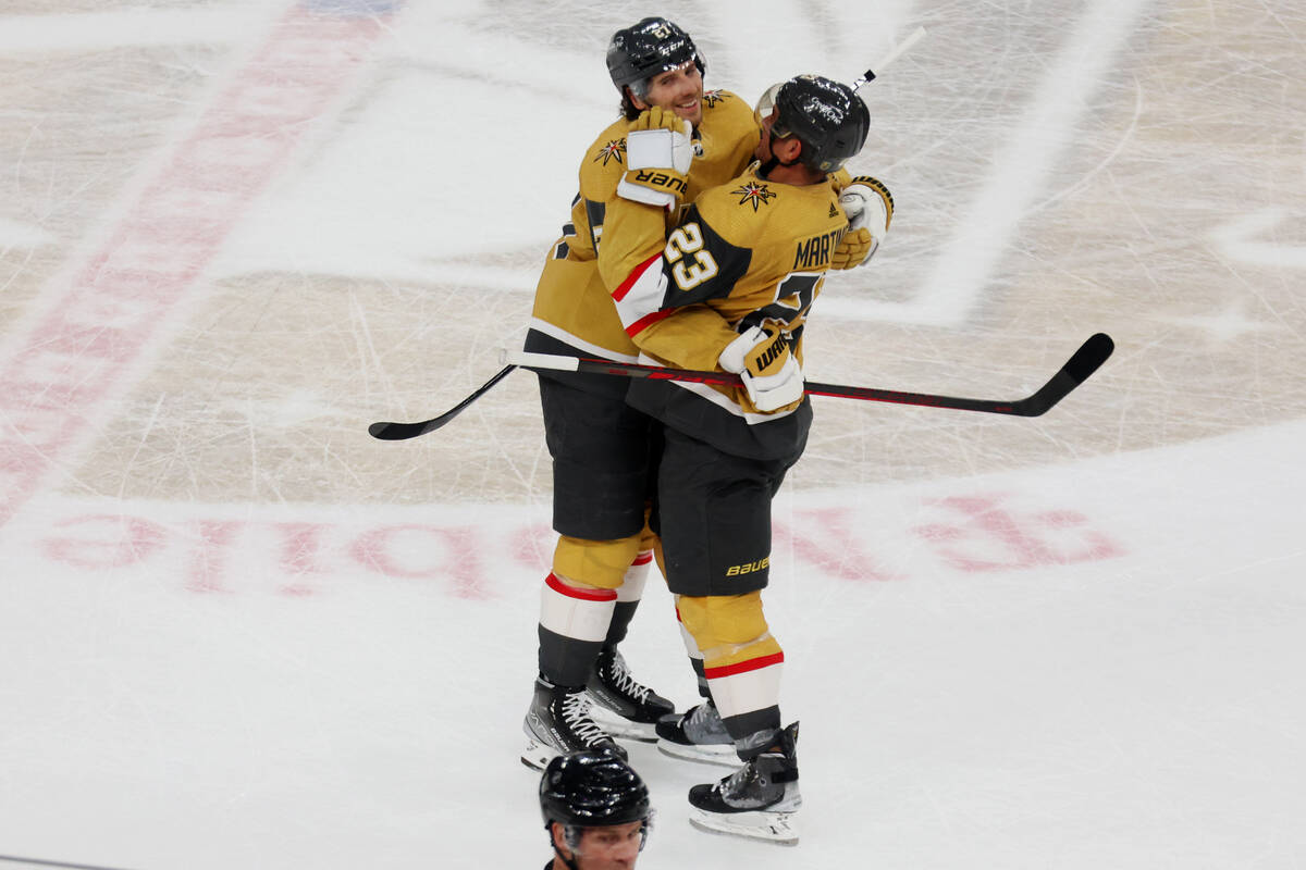 Vegas Golden Knights defenseman Shea Theodore (27) celebrates his game winning shootout goal wi ...