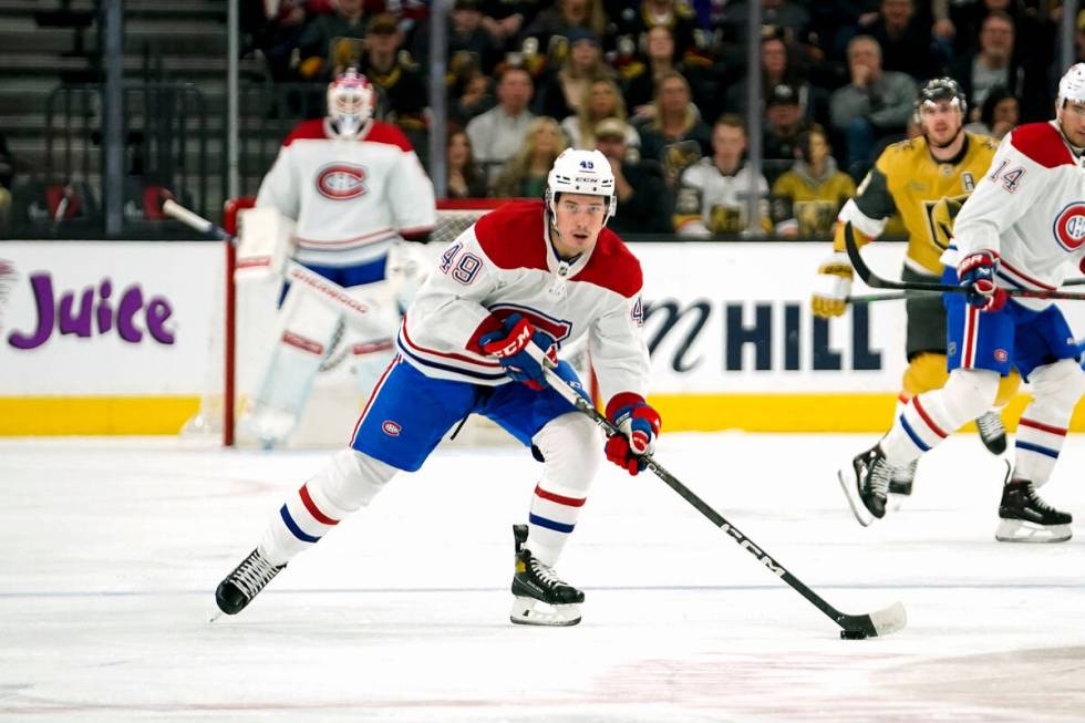 Montreal Canadiens left wing Rafael Harvey-Pinard (49) skates with the puck during the first pe ...