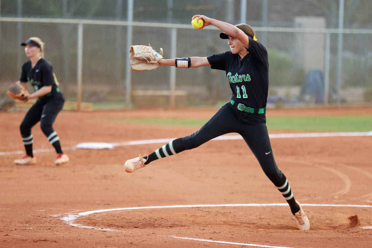 Green Valley’s Avari Morris (11) pitches the ball against Faith Lutheran during a softba ...