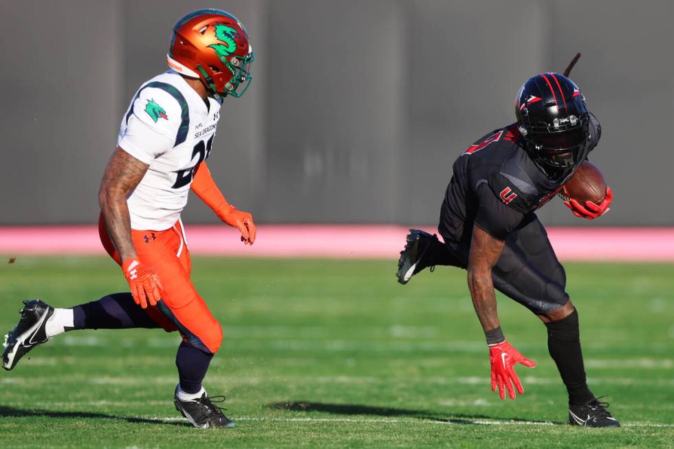 Vegas Vipers wide receiver Martavis Bryant (4) runs the ball after a catch while under pressure ...