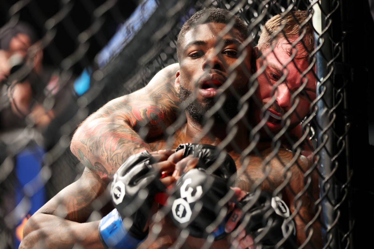 Trevin Jones, left, defends aagainst Cody Garbrandt during a UFC 285 bantamweight fight at T-Mo ...