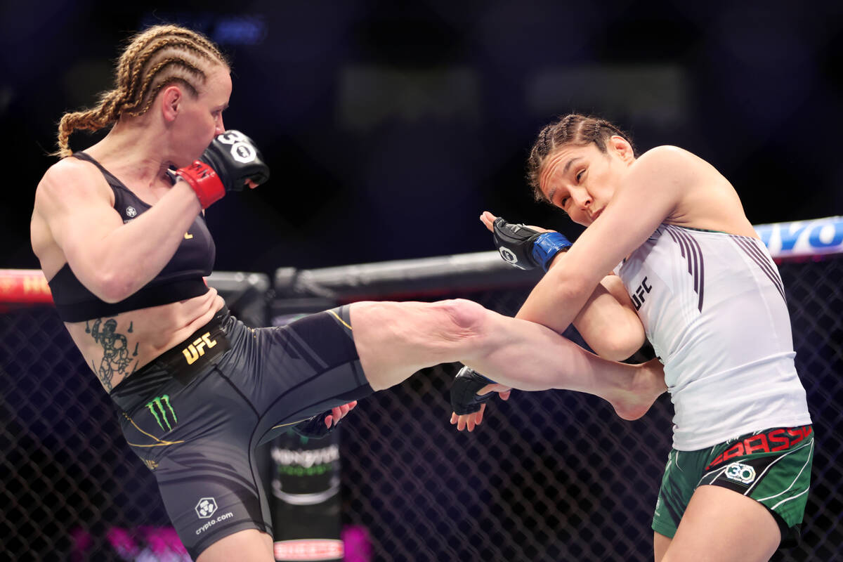 Alexa Grasso, right, defends against Valentina Shevchenko in a women's flyweight title bout dur ...