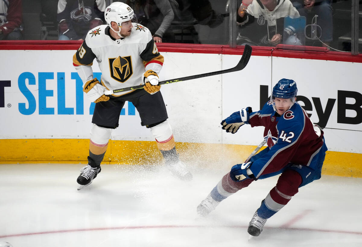 Vegas Golden Knights center Ivan Barbashev (49) and Colorado Avalanche defenseman Josh Manson ( ...