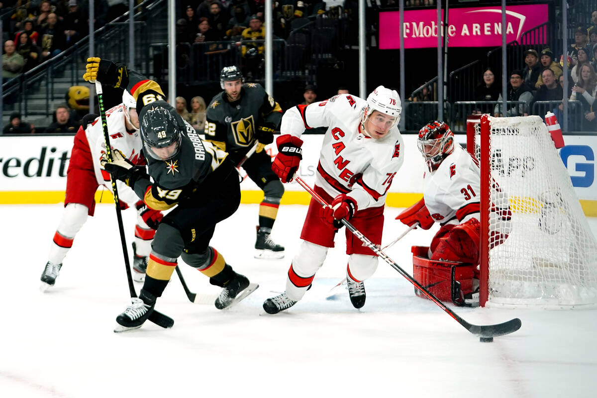 Carolina Hurricanes defenseman Brady Skjei (76) skates with the puck against Vegas Golden Knigh ...