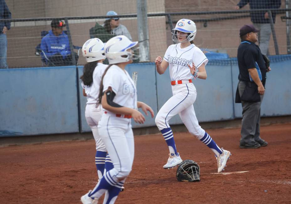 Bishop Gorman's Tiffany Gonzales scores a run against Centennial during a softball game at Bish ...