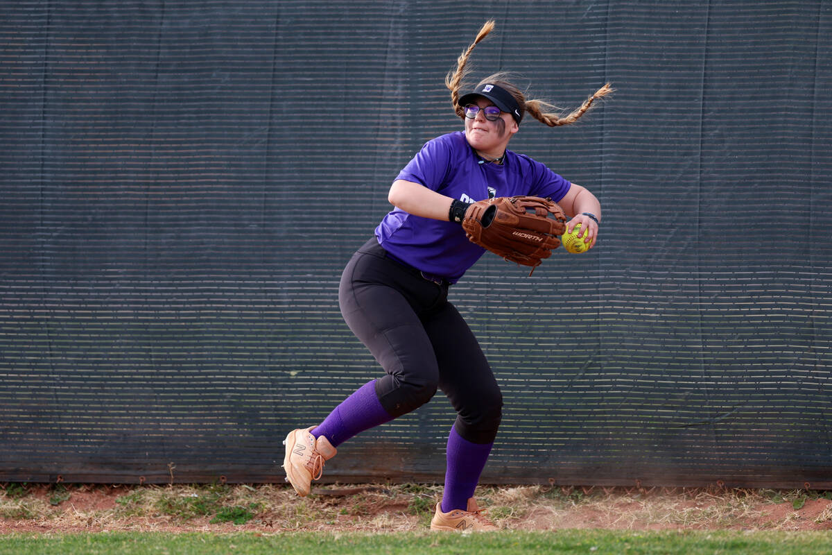 Silverado's Savanna Johnson (17) gets ready to throw the ball to the infield after a hit by Gre ...
