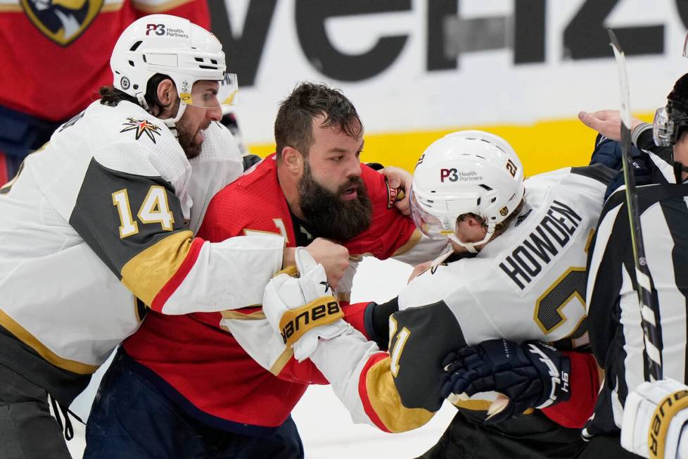 Florida Panthers defenseman Radko Gudas, center, scuffles with Vegas Golden Knights center Bret ...