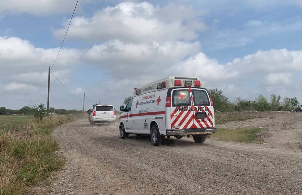 A Mexican Red Cross ambulance transports two Americans found alive after their abduction in Mex ...