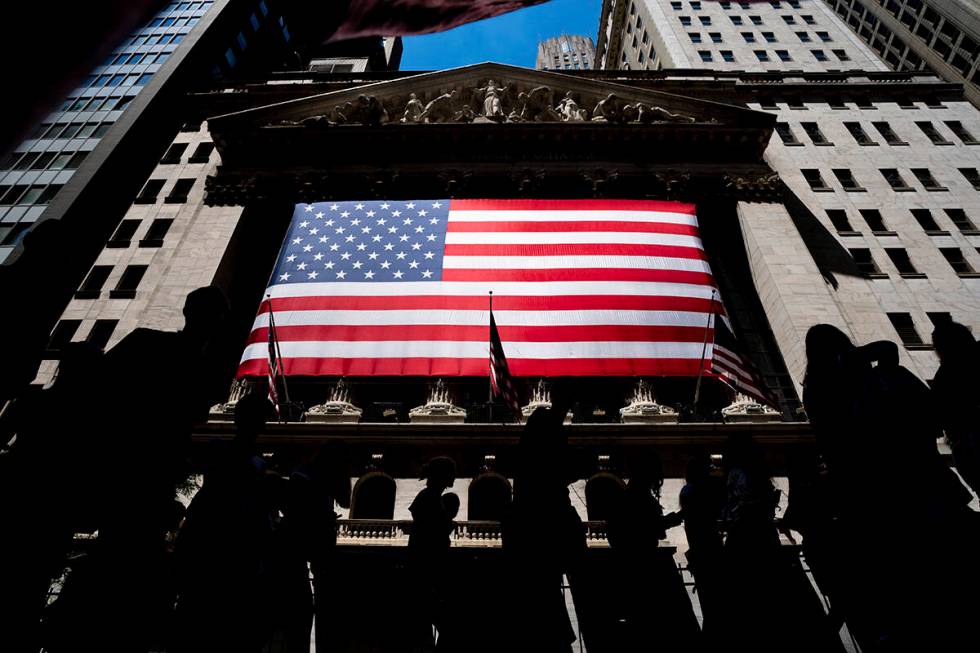 Stocks sank on Wall Street after the head of the Federal Reserve warned it could speed up its e ...