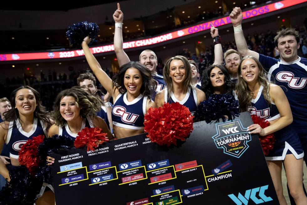 Gonzaga Bulldogs cheerleaders celebrate after their team won a West Coast Conference men&#x2019 ...