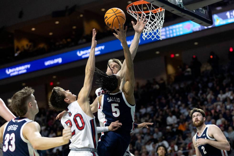 Gonzaga Bulldogs guard Hunter Sallis (5) shoots against St. Mary's Gaels guard Aidan Mahaney (2 ...