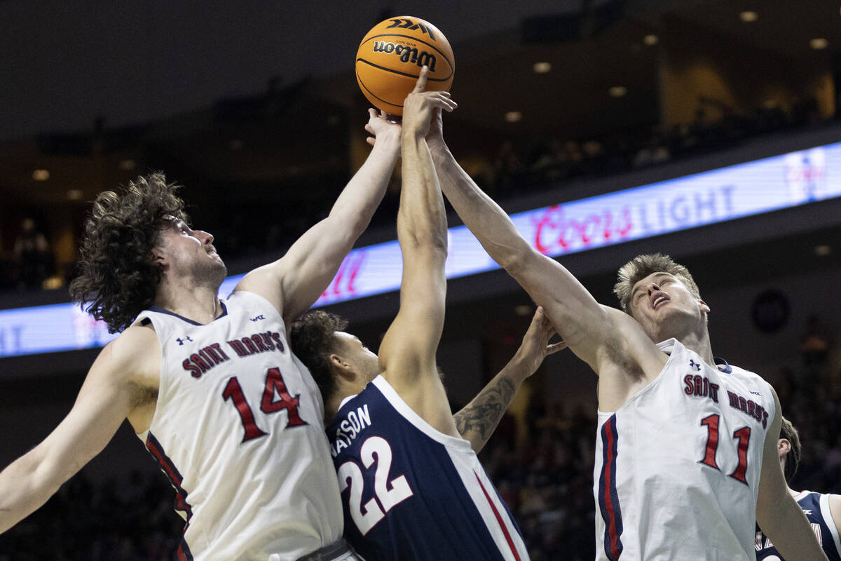 Gonzaga Bulldogs forward Anton Watson (22) shoots against St. Mary's Gaels forward Kyle Bowen ( ...