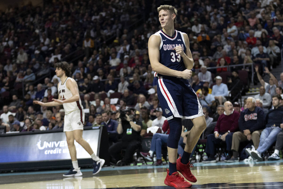 Gonzaga Bulldogs forward Ben Gregg (33) celebrates after blocking a St. Mary's Gaels shot durin ...