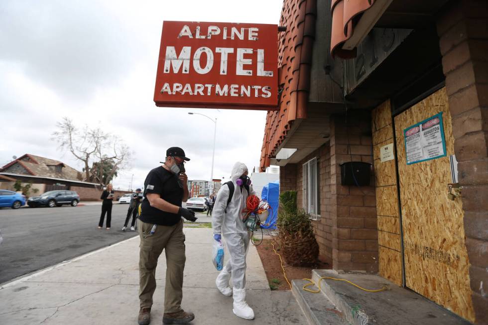 Glenn Gassenberger, left, evidence technician and fire investigation technician with Forensic I ...