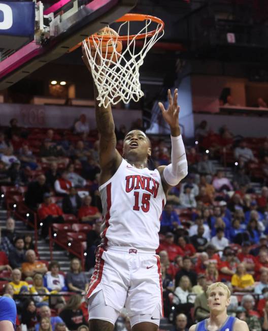 UNLV guard Luis Rodriguez (15) lays up the ball against Air Force during the second half of a b ...