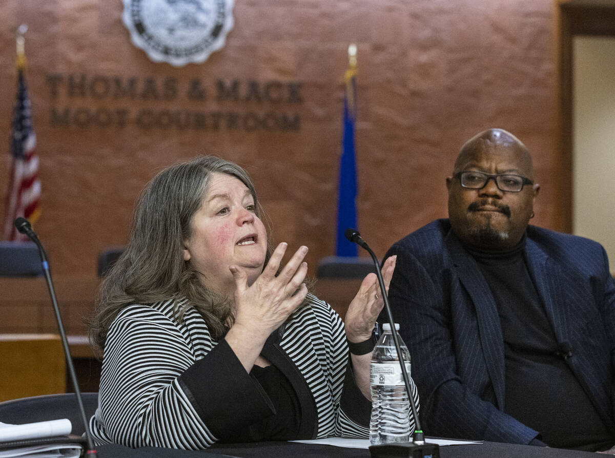 JoNell Thomas, left, the Clark County special public defender, speaks as Judge Richard Boulware ...