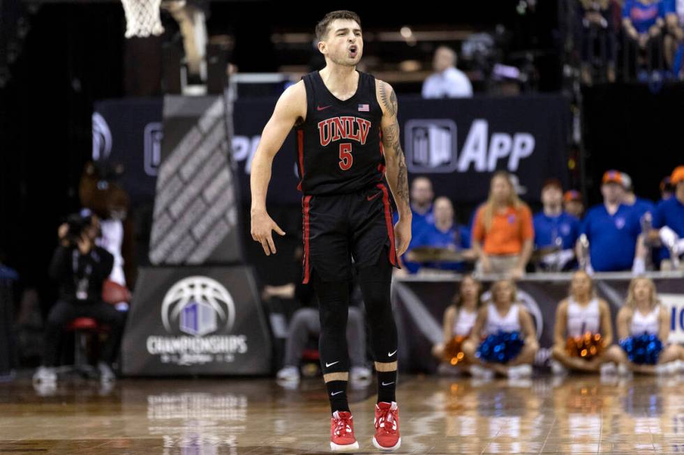 UNLV Rebels guard Jordan McCabe (5) celebrates after scoring a three-pointer during the second ...