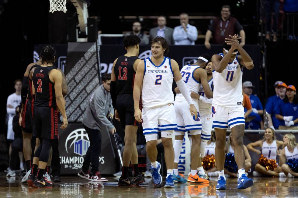 The Boise State Broncos celebrate after referees called a foul on the UNLV Rebels during the fi ...