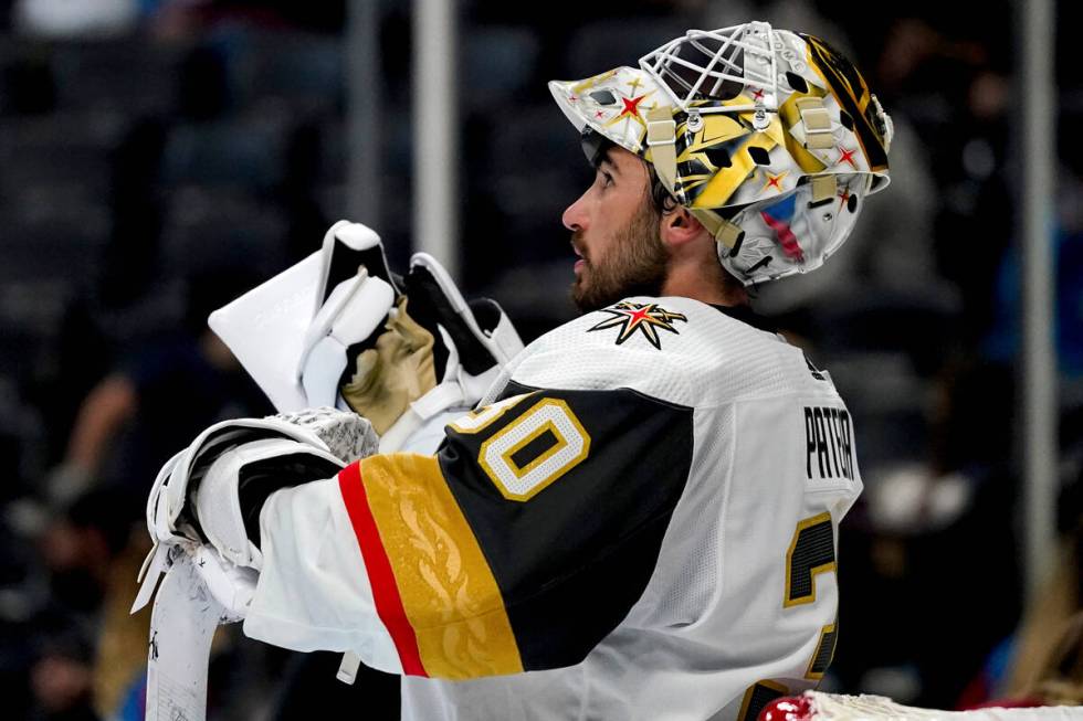 Vegas Golden Knights goaltender Jiri Patera looks on during a pause in play in the third period ...