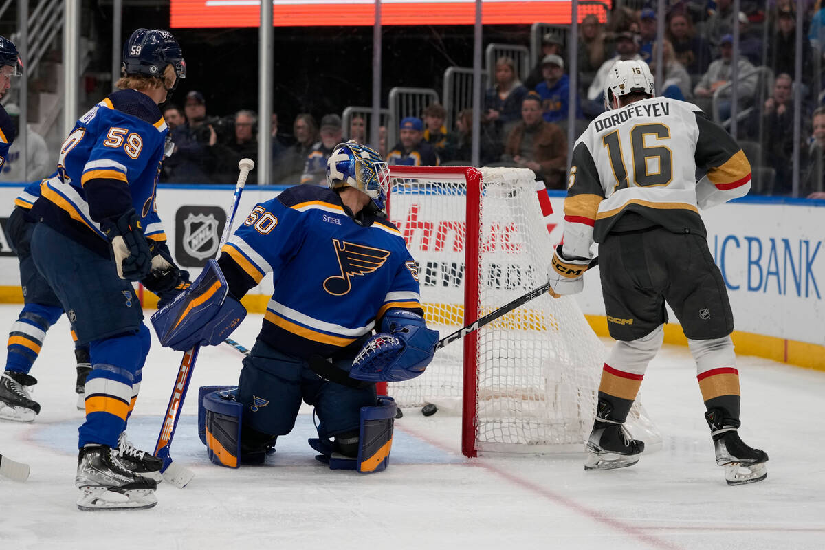 Vegas Golden Knights' Pavel Dorofeyev (16) scores past St. Louis Blues goaltender Jordan Binnin ...