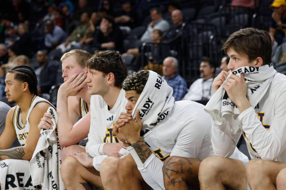 UC Irvine Anteaters players watch their teammates during the second half of an NCAA college bas ...