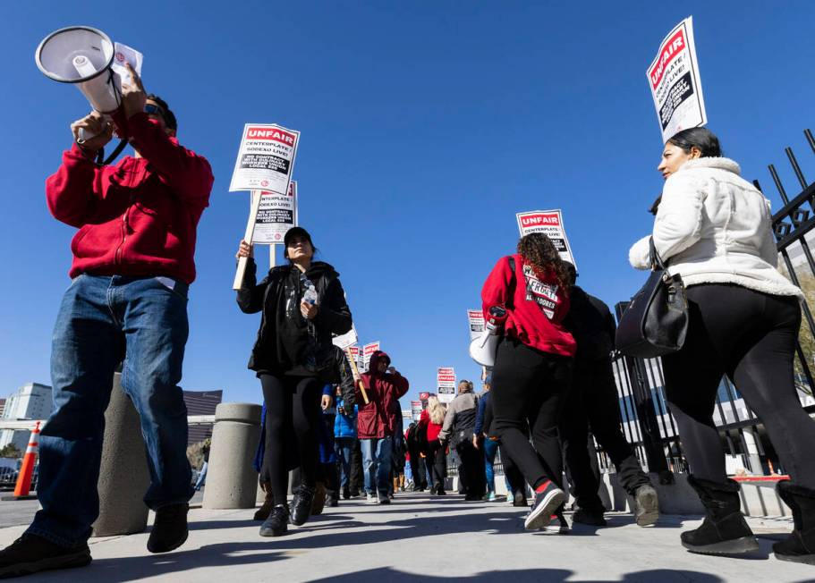 Culinary Union workers picket in front of the Las Vegas Convention Center, on Thursday, Feb.16, ...