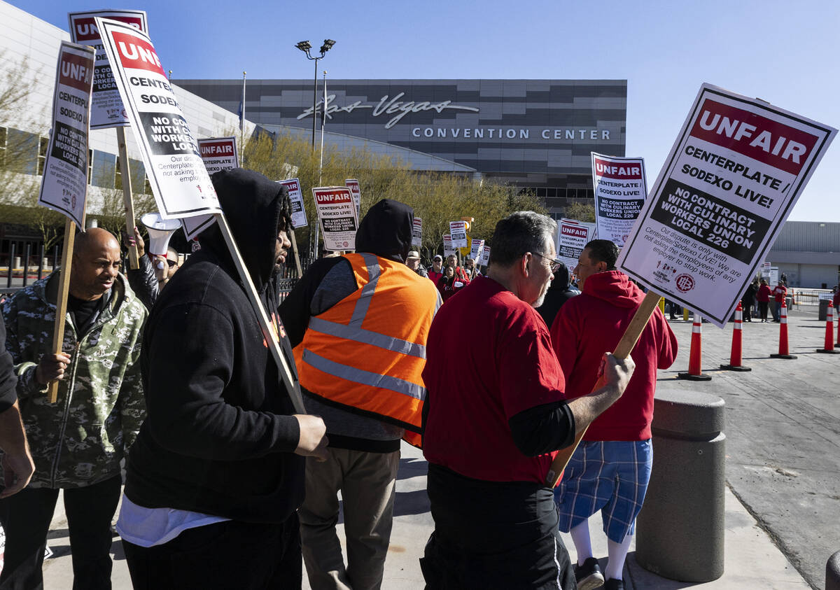 Culinary Union workers picket in front of the Las Vegas Convention Center, on Thursday, Feb.16, ...