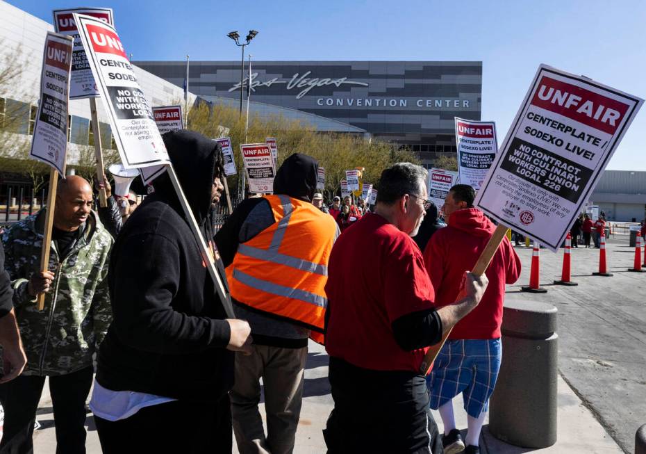 Culinary Union workers picket in front of the Las Vegas Convention Center, on Thursday, Feb.16, ...