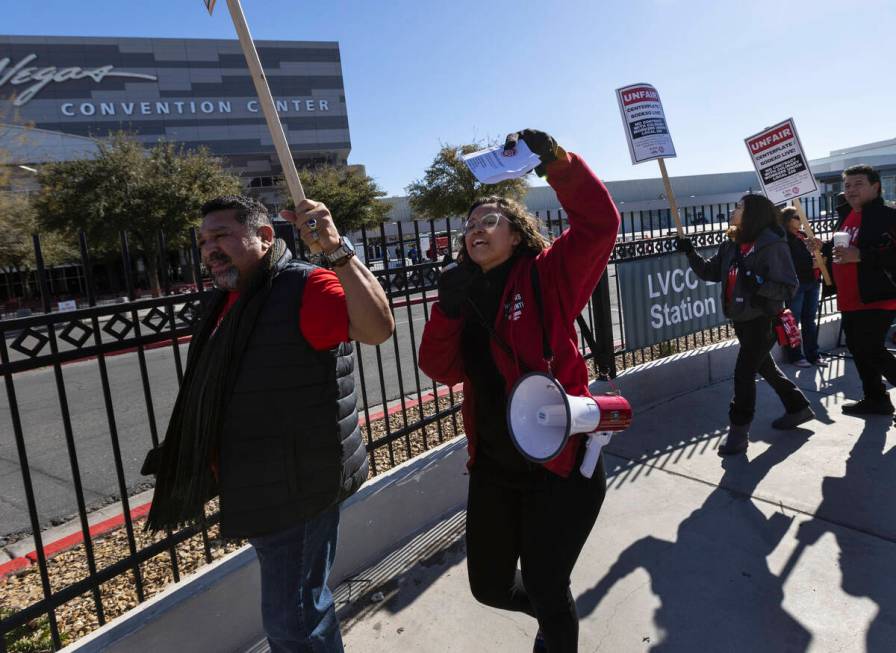 Diamante Asberry, a researcher at Culinary Union Local 226, shouts slogans as Culinary Union wo ...