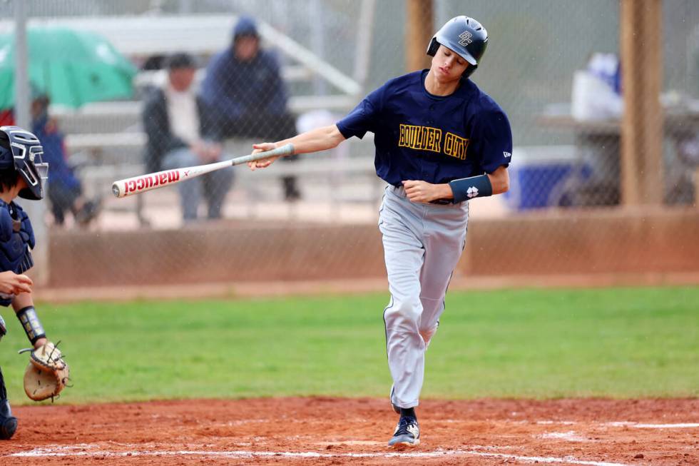 Boulder City's Isaac Gibson (6) advances to first base after a walk during a spring break baseb ...