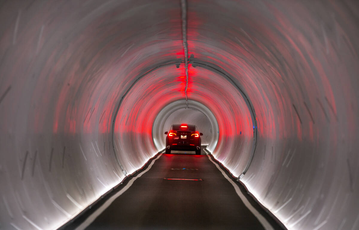 A Tesla is navigated from the West Hall to Central Hall in the Boring Company's Convention Cent ...