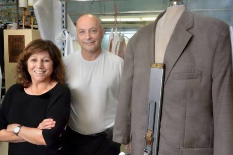 Dan and Judy Del Rossi, owners of Tiffany Couture Cleaners, are seen in the cleaning and pressi ...
