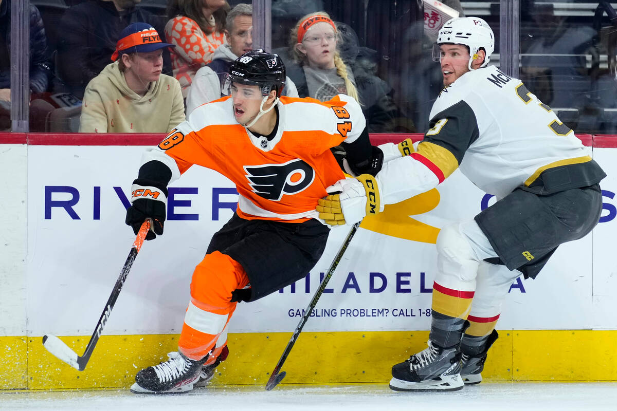 Vegas Golden Knights' Brayden McNabb, right, tries to slow Philadelphia Flyers' Morgan Frost du ...