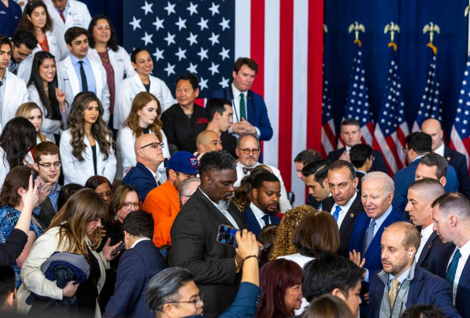 President Joe Biden greets attendees after talking about lowering prescription drug costs durin ...