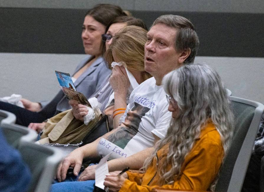 Cindy Peters, center, the mother of Rebekah Peters, a murder victim, weeps as she attends the s ...