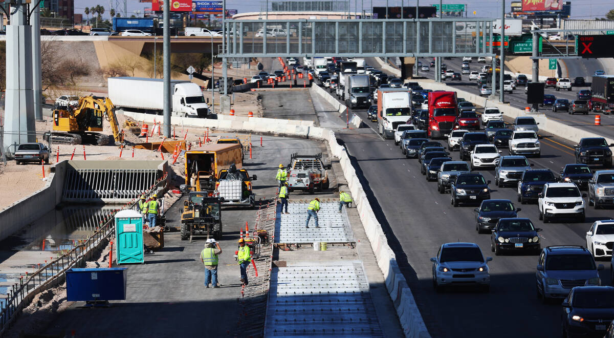 Highway construction is seen as part of the I-15/Tropicana project near West Harmon Avenue in L ...