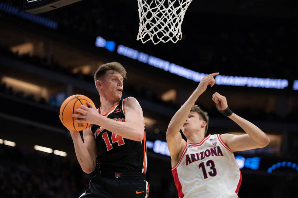 Princeton guard Matt Allocco (14) grabs a rebound in front of Arizona forward Henri Veesaar (13 ...