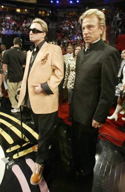 Sigfried Fischbacher, right, and Roy Horn attend the 2007 NBA All-Star Game at the Thomas & Mac ...