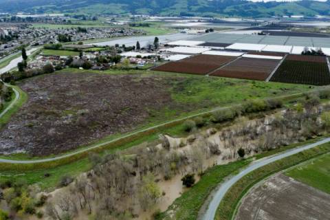 This photo shows a flooded Pajaro River area in Pajaro, Calif. on Tuesday, March 14, 2023. (Cal ...