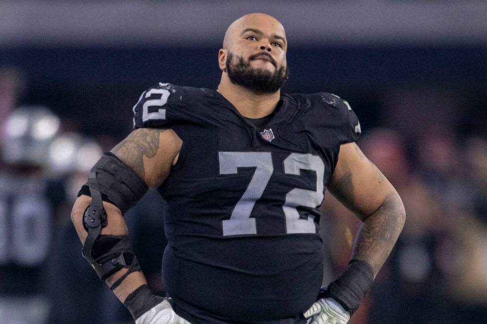 Raiders offensive lineman Jermaine Eluemunor (72) looks to a replay as the against the San Fran ...