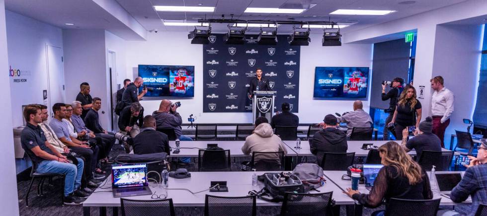 Jimmy Garoppolo speaks joined by his family, left, during a press conference at the Raiders Hea ...