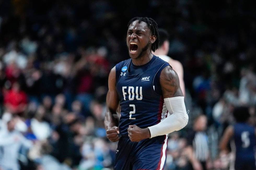 Fairleigh Dickinson guard Demetre Roberts (2) celebrates in the second half of a first-round co ...