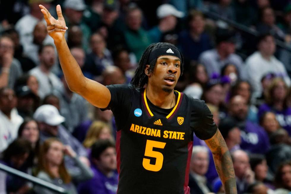 Arizona State forward Jamiya Neal gestures after hitting a basket against TCU in the first half ...