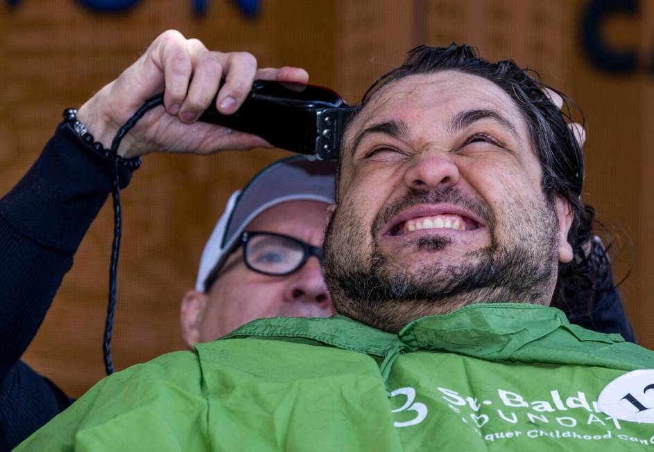 Fundraiser David Rendon with The Signature at MGM Grand reacts to having his head shaved by sty ...