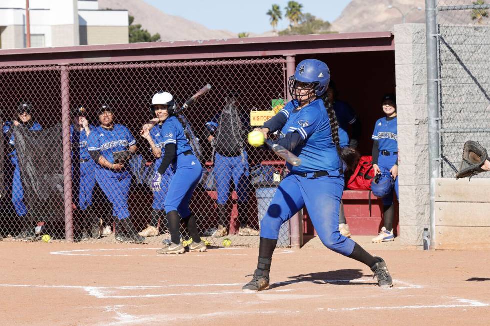 Desert Pines' Alondra Garcia (16) hits the ball during the second inning of a softball game aga ...