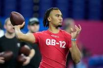 Ohio State quarterback CJ Stroud runs a drill at the NFL football scouting combine in Indianapo ...