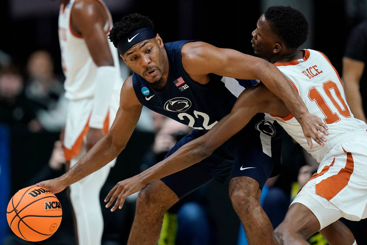 Texas guard Sir'Jabari Rice (10) tries to steal the ball from Penn State guard Jalen Pickett (2 ...